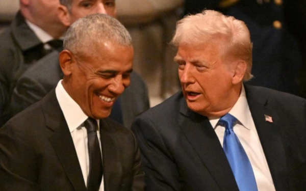 What did Mr. Trump say that made Mr. Obama laugh at Mr. Carter's funeral?