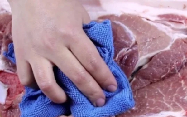 Why do butchers cover pork with cloth?