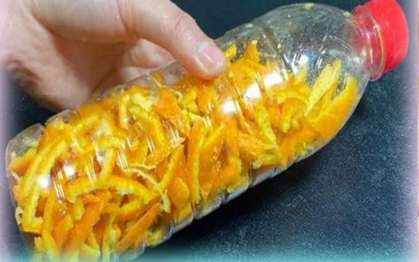 Stuffing orange peels into empty water