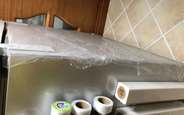 Keep Your Fridge Spotless with Plastic Wrap