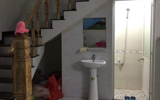 Why is it not recommended to build a bathroom under the staircase?